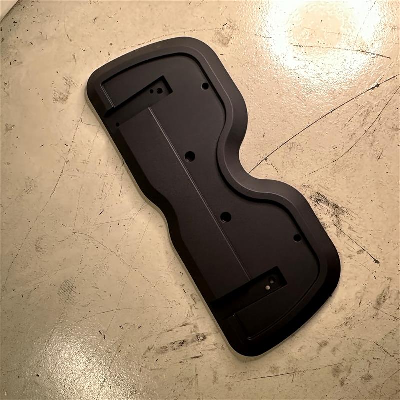 AW7106111-036 Seat back cover (plastic)